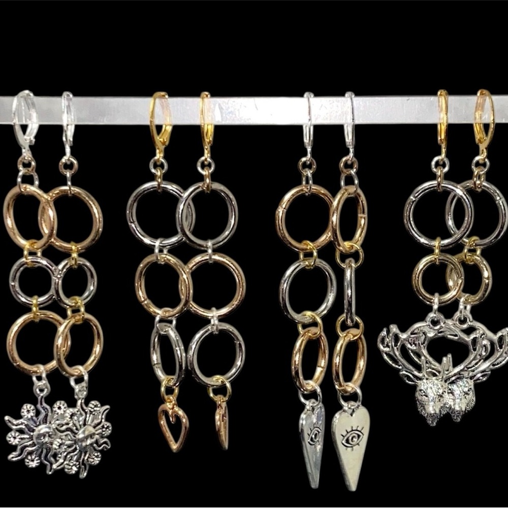 Gold and Silver Dangle Earrings with Geometric Patterns